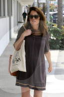 Robin Tunney flaunts a large baby bump while heading out to lunch