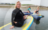 FEATURE - Anspruchsvoll: Paddleboard Yoga