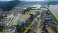 NEWS - China: Heftige Regenfälle verursachen Überschwemmungen