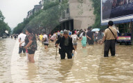 NEWS - China: Heftige Regenfälle verursachen Überschwemmungen