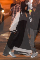 Rihanna keeps it casual in an oversized coat