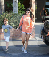 Kourtney Kardashian loves her orange Life of Pablo shirt