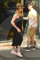 Jennifer Aniston keeps her face hidden under a large fedora