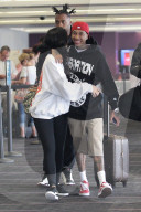 EXKLUSIV - Kylie Jenner und Tyga turteln am Flughafen in Los Angeles