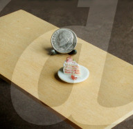 FEATURE - Miniatur-Mahlzeiten aus Ton