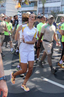 Izabel Goulart carries the Olympic Torch to start the games in Rio