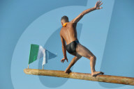 FEATURE - Teilnehmer beim 'Greased Pole' Wettbewerb in Italien