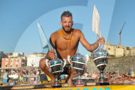 FEATURE - Teilnehmer beim 'Greased Pole' Wettbewerb in Italien