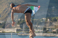 FEATURE - Teilnehmer beim 'Greased Pole' Wettbewerb in Italien