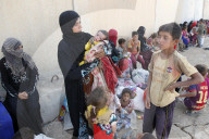 NEWS - Iraker fliehen vor ISIS nach Jordanien und in die Türkei