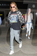 PEOPLE - Cara und Poppy Delevingne landen gemeinsam in LA