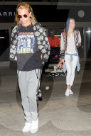 PEOPLE - Cara und Poppy Delevingne landen gemeinsam in LA