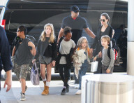 Exclusive... Angelina Jolie Catches A Flight At LAX With Her Children - ADD WEB FEES  