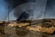 NEWS -  Irak: Brennende Ölfelder in Qayyara