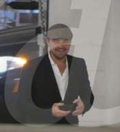 *EXCLUSIVE* Leonardo DiCaprio attends a benefit for Malawi in Miami Beach hosted by Madonna