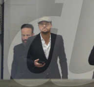 *EXCLUSIVE* Leonardo DiCaprio attends a benefit for Malawi in Miami Beach hosted by Madonna