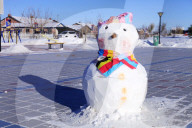 FEATURE - China: Schneemänner in Heilongjiang 