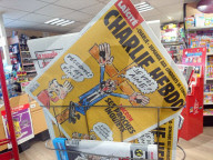 NEWS - Wahlen Frankreich: Emmanuel Macron auf dem Cover von Charlie Hebdo