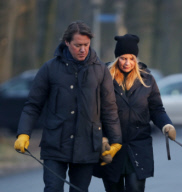 LINDA DE MOL and partner take a walk with their dogs