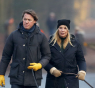 LINDA DE MOL and partner take a walk with their dogs