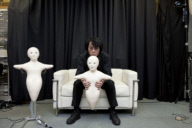 Hiroshi Ishiguro with his Telenoid robot
