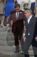 PEOPLE - Elton John und David Furnish gehen mit ihren Kindern an eine Hochzeit