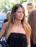 Heidi Klum Goes Make-Up Free as she Leaves a Downtown Hotel