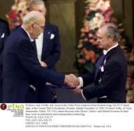 Professor Jack S Kilby, left, receives the Nobel Prize in physics from Swedish King Carl XVI Gustaf, right, at the Concert Hall in Stockholm, Sweden, Sunday December 10, 2000. Professor Kilby, of Texas Instruments, Dallas, TX, USA, shares the prize with Z