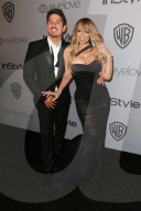 PEOPLE - Bryan Tanaka kann seine Finger nicht von Mariah Carey lassen