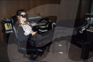 Frau mit Fernseh-Brille "Virtual Vision Sport", 1995