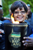 Winnie Mandela receives ANC centenary flame, Orlando, Soweto, South Africa - 30 Jun 2012