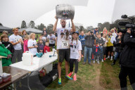 FEATURE - Dorking: Wife Carrying Race - Männer schleppen ihre Frauen