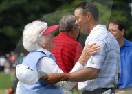 Tiger Woods and former President Bush attend unaugural golf tournament