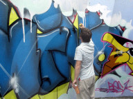 Sprayer in Aktion, Graffito, 2005