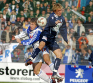 Fussball,  NLA  -  Grasshopper-Club - FC Zuerich  Christoph Spycher im Duell mit Daniel Gygax.  Foto  Manuel Geisser