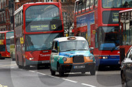 Taxis und Doppeldeckerbusse  London UK