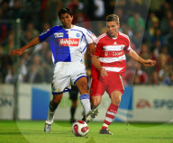 Fussball Grasshopper Club - FC Bayern Muenchen Rinaldo gegen Lukas Podolski