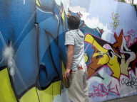 Sprayer in Aktion, Graffito, 2005