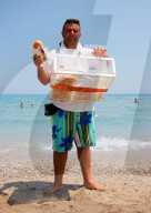 Donuts - Verkäufer am Strand Griechenland