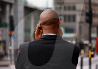 Broker mit Handy  London UK
