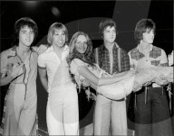 Pop Group Bay City Rollers With Fashion Model Twiggy The Bay City Rollers Were A Scottish Pop Band Whose Popularity Was Highest In The 1970s. The British Hit Singles & Albums Noted That They Were 'tartan Teen Sensations From Edinburgh' And Were 't