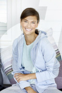 Sporty woman in blue hoodie