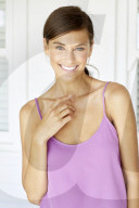 Beautiful young woman in lilac top