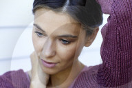Beautiful woman in lilac pullover