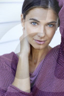 Beautiful woman in lilac pullover