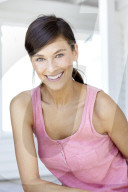 Dark haired woman in pink tank top