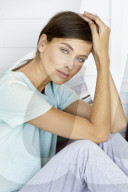 Sporty woman relaxing on the terrace