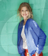 Blonde woman wearing blue blouson