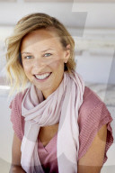 Portrait of a young Woman wearing T-Shirt and a Scarf