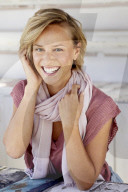 Portrait of a young Woman wearing T-Shirt and a Scarf